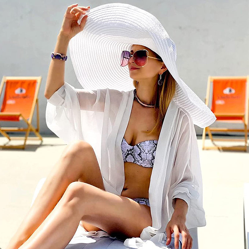 femme qui porte le Chapeau blanc d'été XXL pour femme protection solaire large bord chapeau XXL chapeau souple chapeau pour femme chapeau pliable chapeau de plage Chapeau d'été collection Summer Chic de la Boutique Petites Aventures